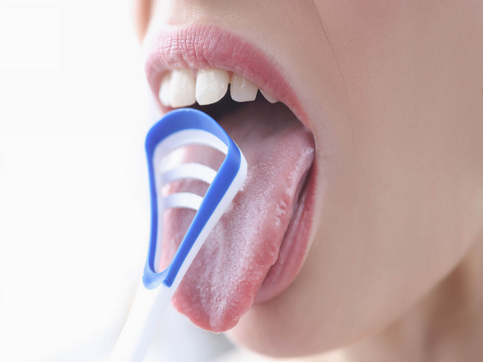 Oral Health Benefits of Tongue Cleaning: Fresher Breath and More